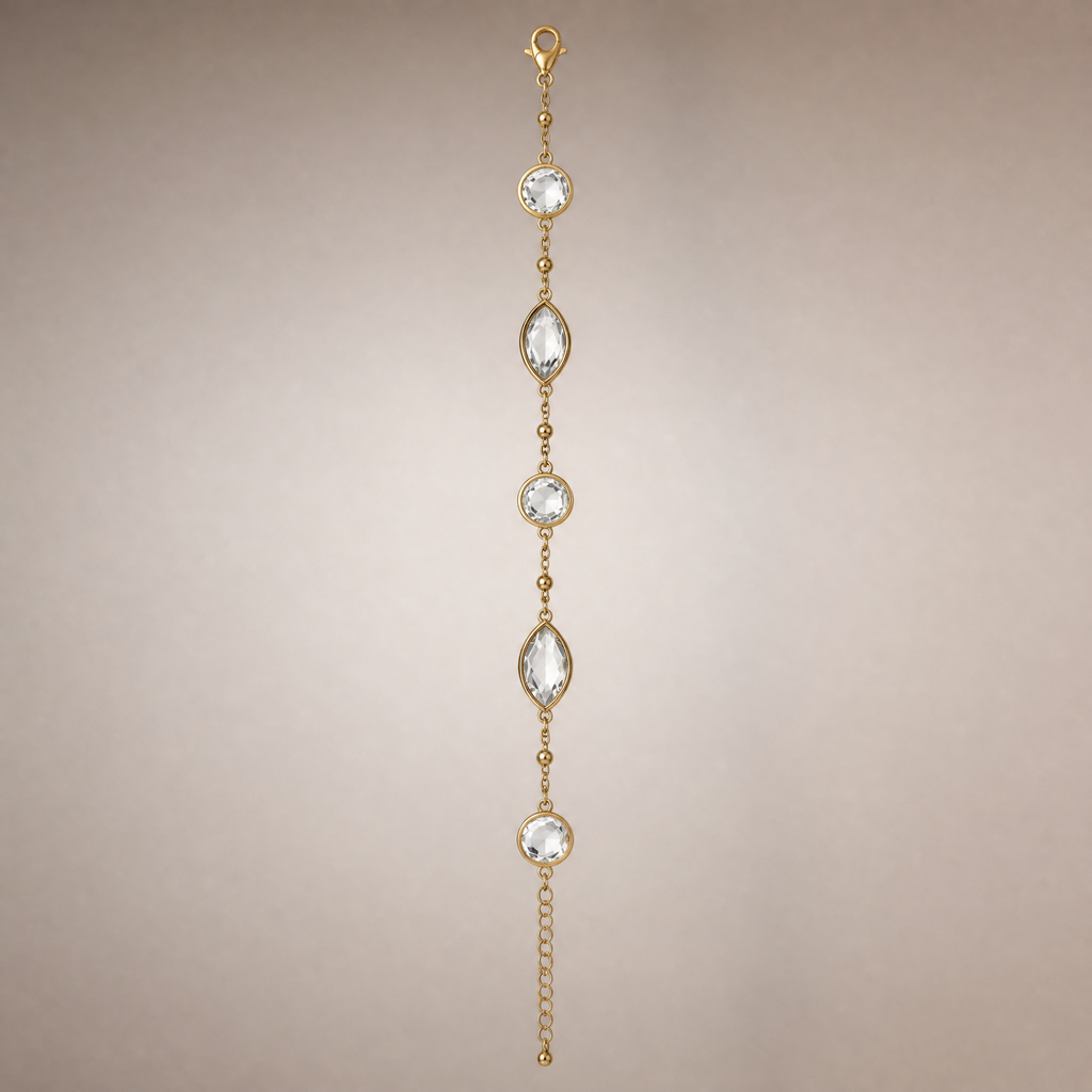 Gold crystal station bracelet with round & marquise clear stones