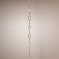Gold crystal station bracelet with round & marquise clear stones
