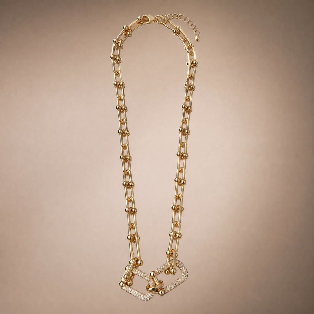 Gold chunky U-link necklace with pave centre link