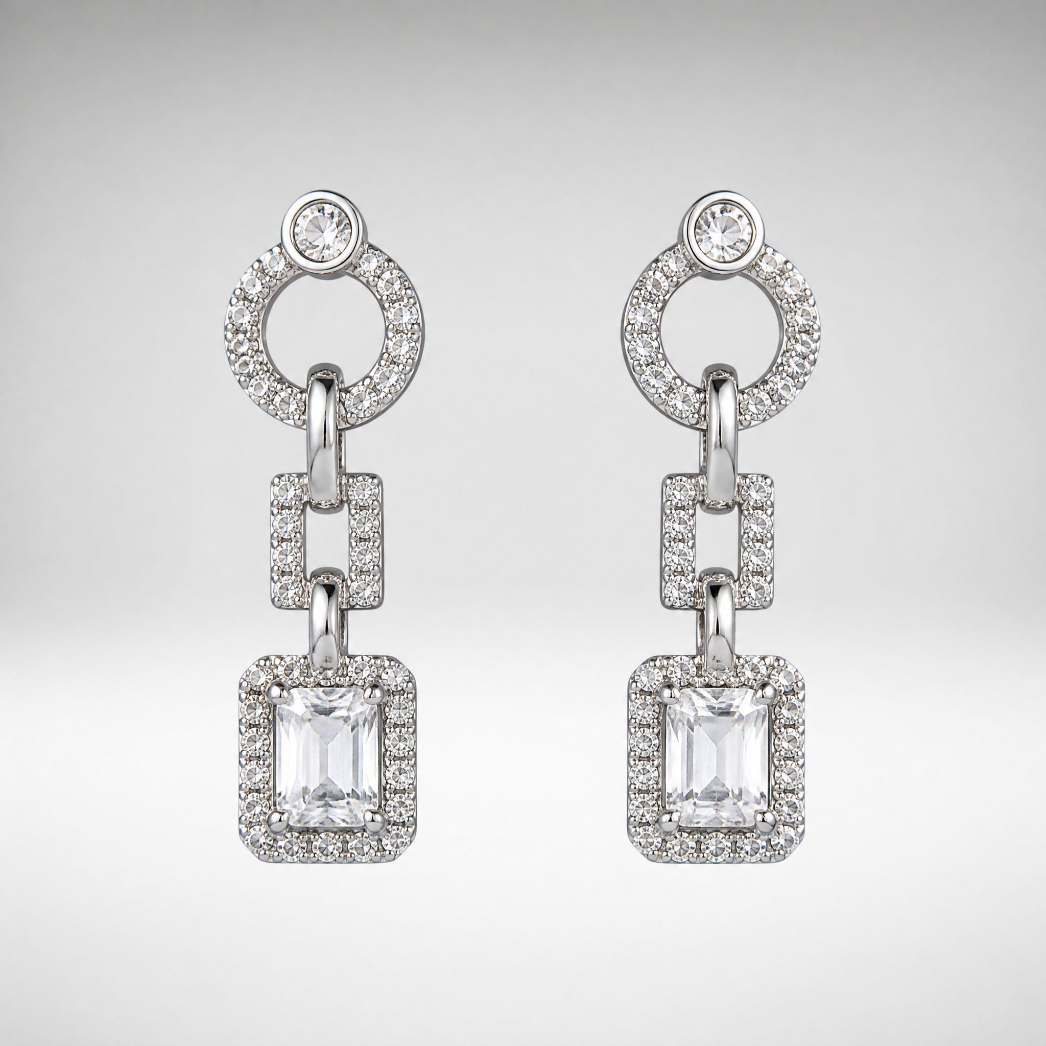 Silver CZ drop earrings with emerald-cut stone