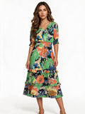 Green and orange floral print tiered ruffle dress with puff sleeves