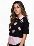 Black layered t-shirt with pink collar and bow applique