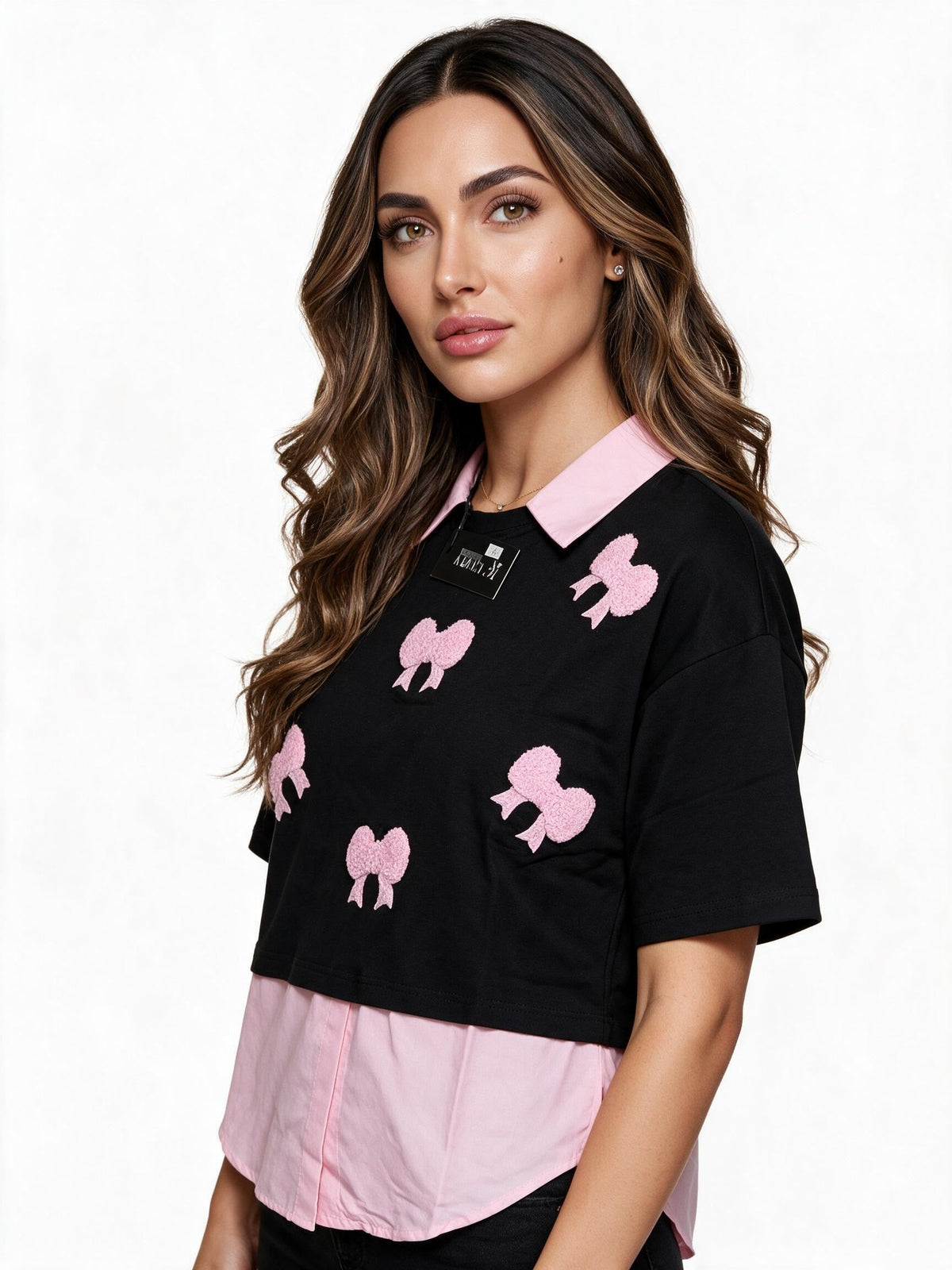 Black layered t-shirt with pink collar and bow applique