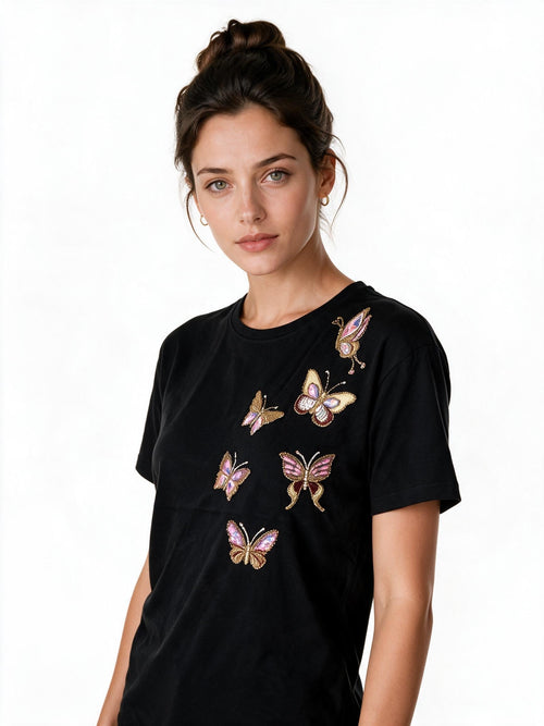 Black t-shirt with pink and gold sequin butterflies