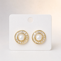 Gold tone pearl centre baguette halo stud earrings