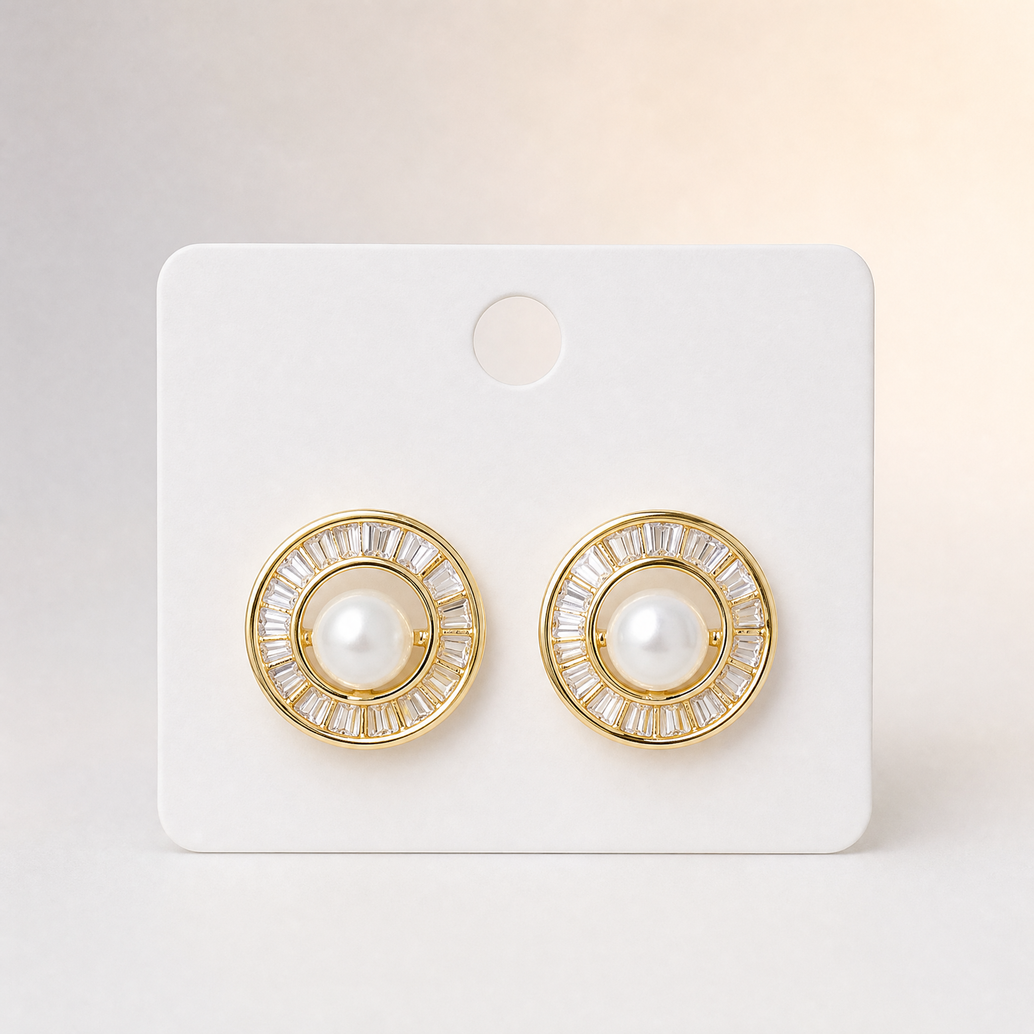 Gold tone pearl centre baguette halo stud earrings