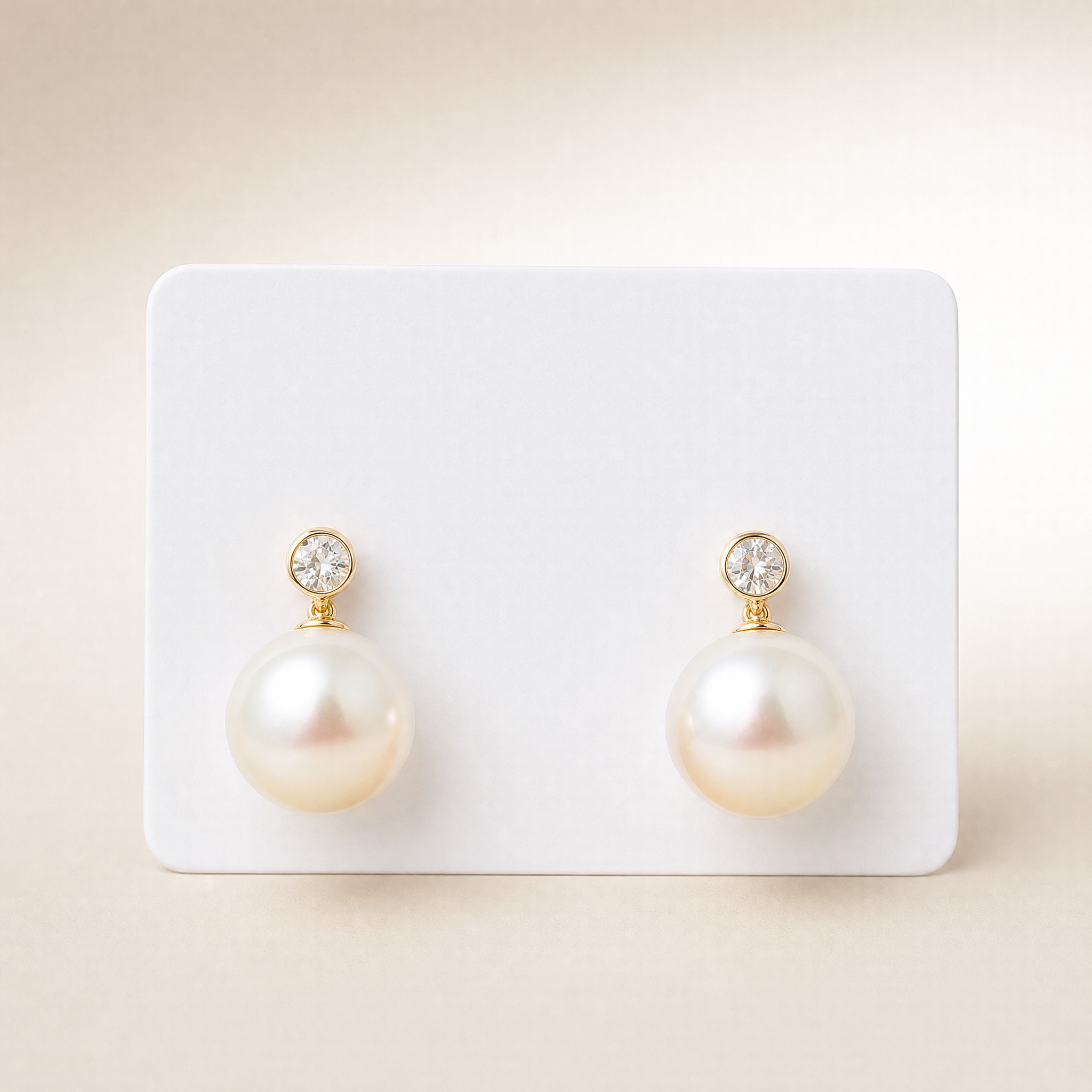 Gold tone crystal stud cream pearl drop earrings