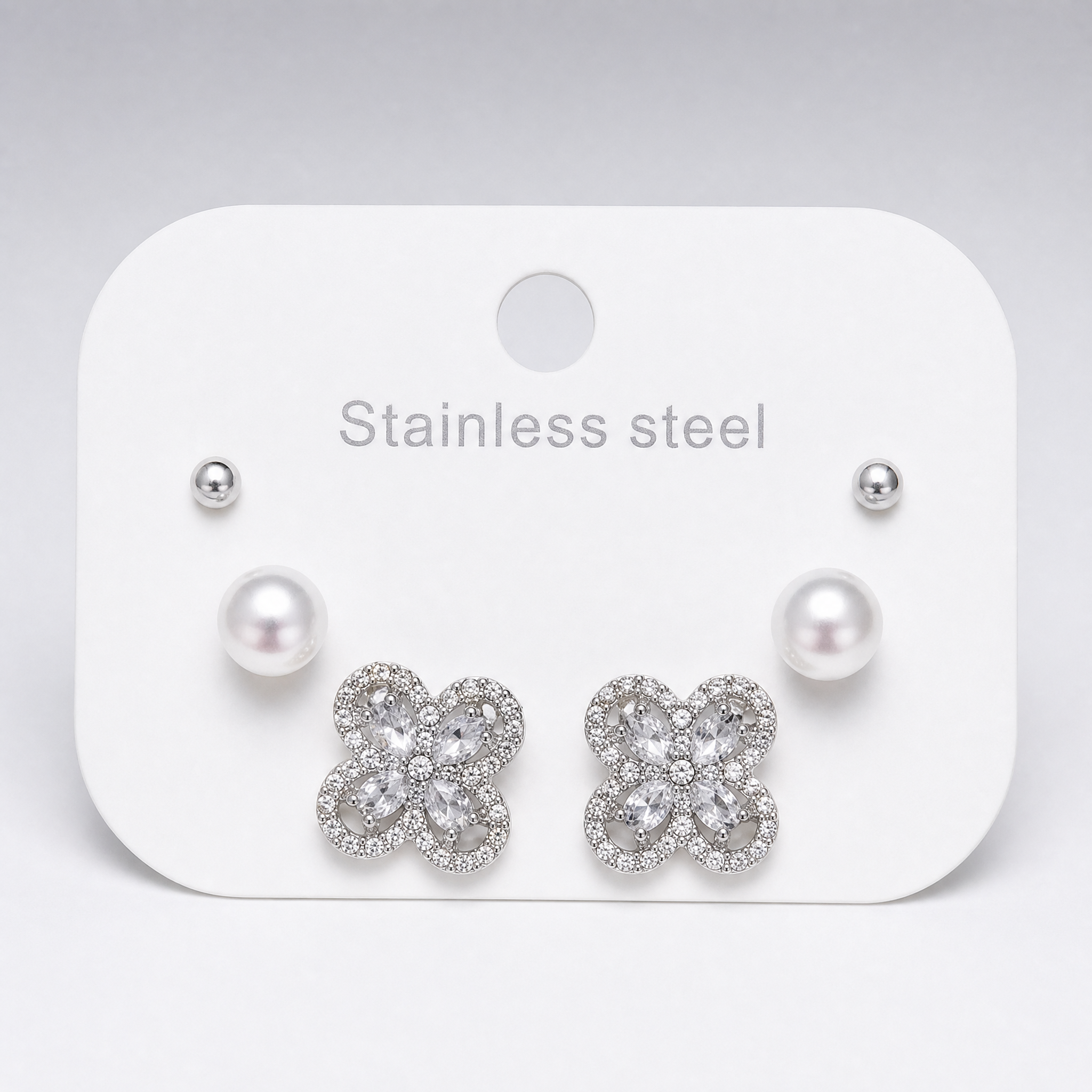 Silver tone 3-pair stud earring set with ball, pearl & crystal clover studs