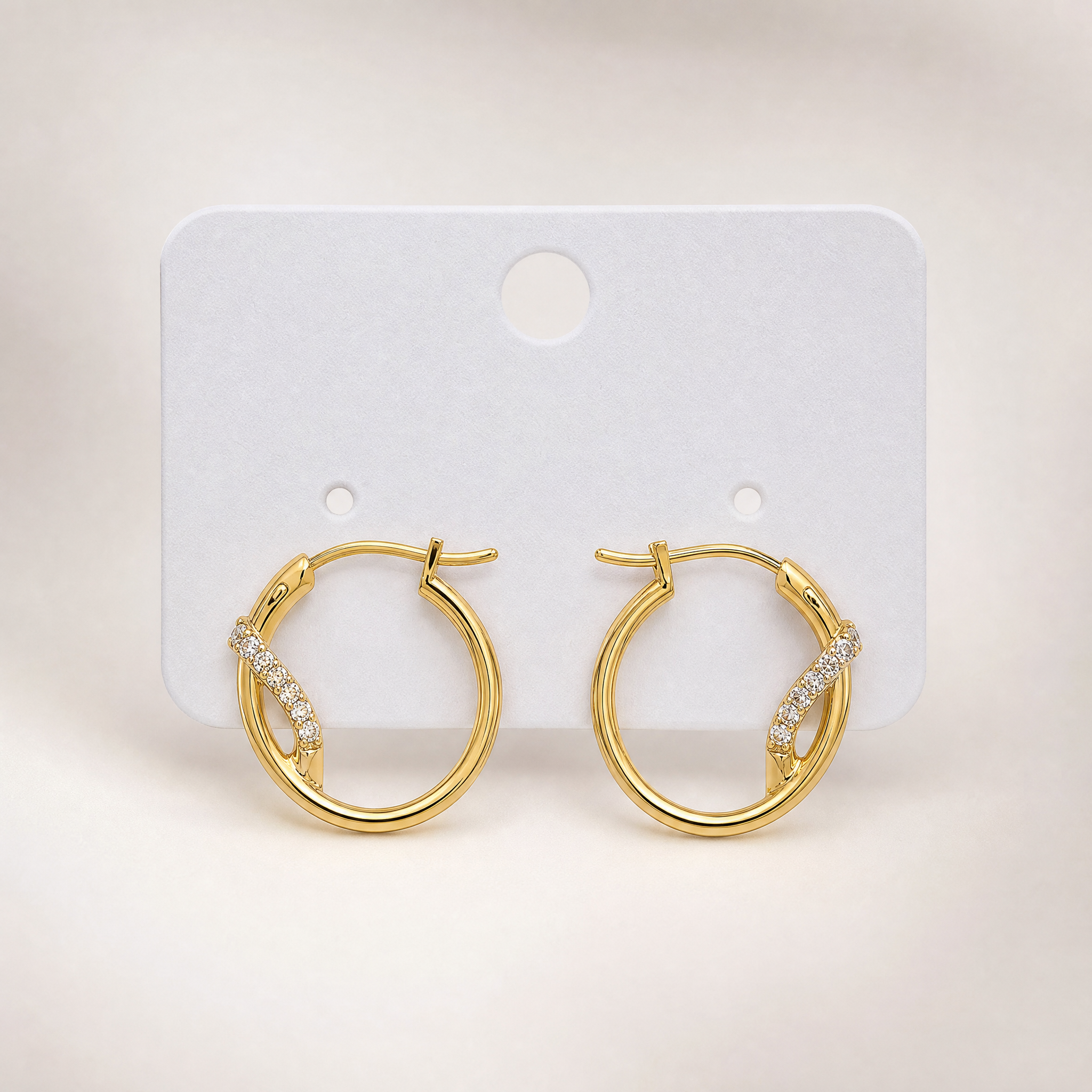 Gold tone crystal wrap hoop earrings