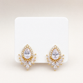 Gold tone teardrop crystal cluster stud earrings