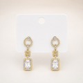 Gold tone emerald cut crystal halo drop earrings
