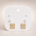 Gold tone 3-pair stud earring set with pearl & champagne crystal clover studs