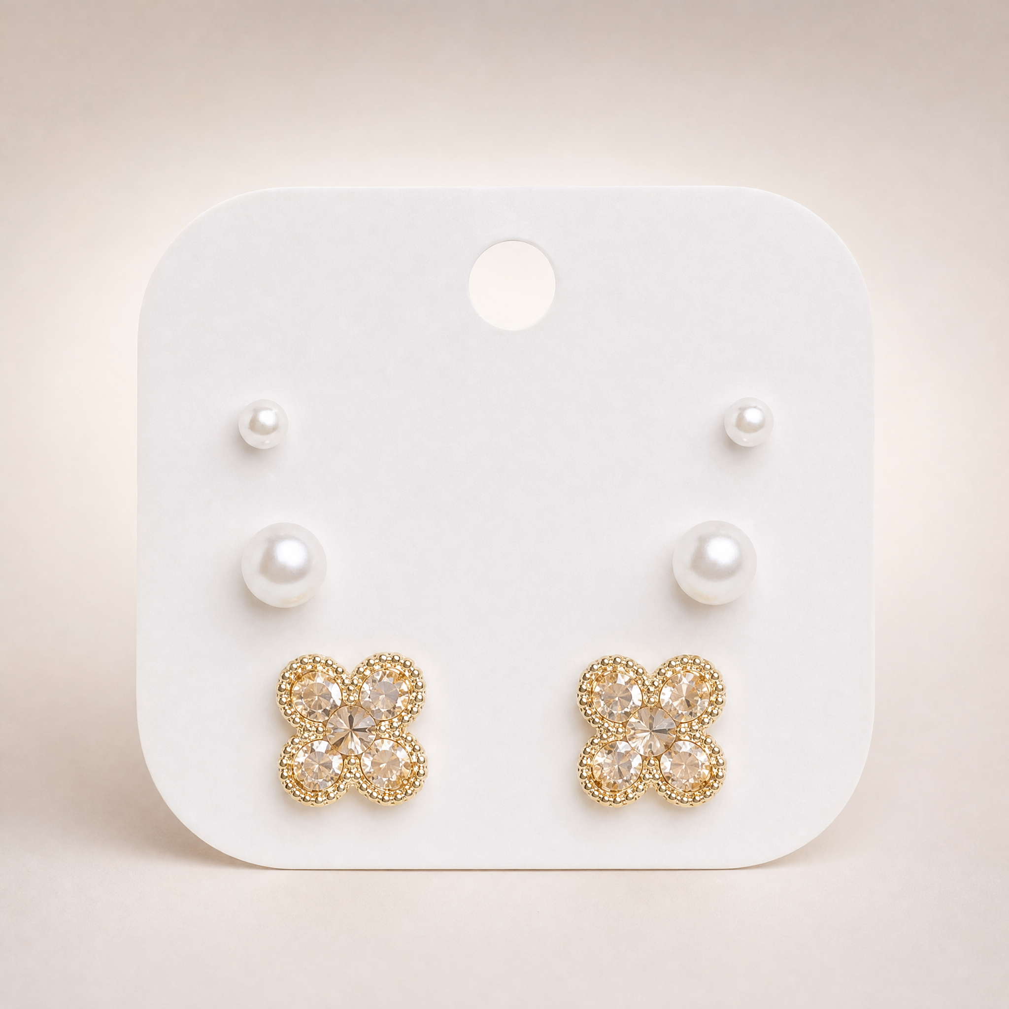 Gold tone 3-pair stud earring set with pearl & champagne crystal clover studs