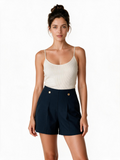 Dark green tailored shorts with gold-tone buttons