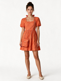 Orange textured puff sleeve dress with matching shoulder pouch