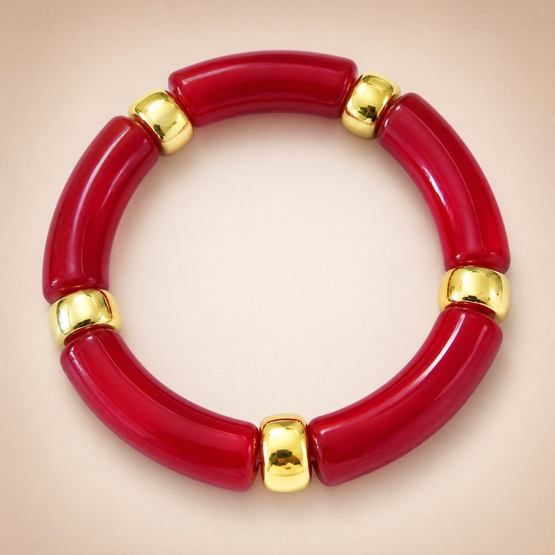 Deep-red curved-tube stretch bracelet, gold spacers