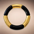 Black-marble & gold wide curved-tube stretch bracelet