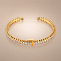 Gold open cuff bangle, CZ tennis row, ball ends