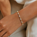 Gold bracelet, oval CZ solitaires & pavé open-oval links