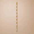 Gold bracelet, oval CZ solitaires & pavé open-oval links