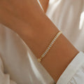 Gold bracelet, marquise-CZ leaf links, double row