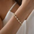 Gold heart-CZ link bracelet, pavé halos