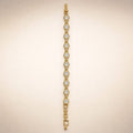 Gold heart-CZ link bracelet, pavé halos