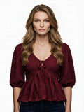 Burgundy textured ruffle peplum blouse