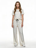 White top and wide-leg trousers set