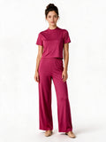 Pink top and wide-leg trousers set