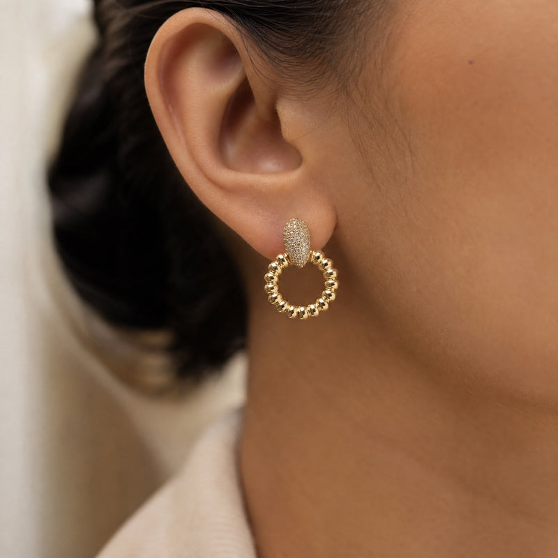 Gold CZ pavé oval-top ribbed circle drop earrings