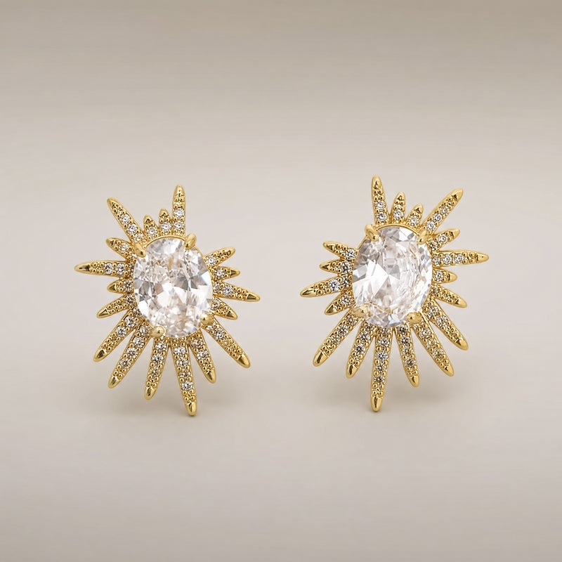 Gold CZ sunburst studs, oval solitaire centre