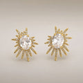 Gold CZ sunburst studs, oval solitaire centre