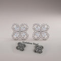 Silver CZ pavé flower studs, pear-cut petals