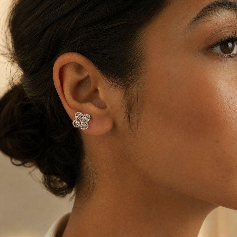 Silver CZ pavé flower studs, pear-cut petals
