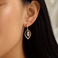 Gold drop earrings, marquise CZ in open pavé leaf frame