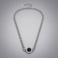 Silver curb-chain necklace, Roman numeral disc pendant
