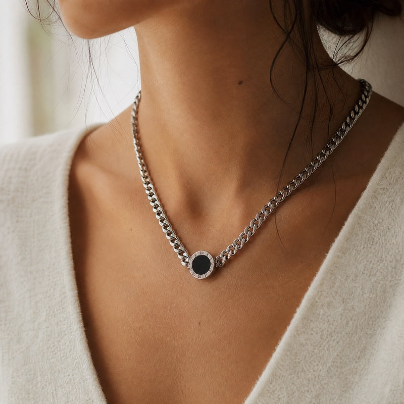 Silver curb-chain necklace, Roman numeral disc pendant