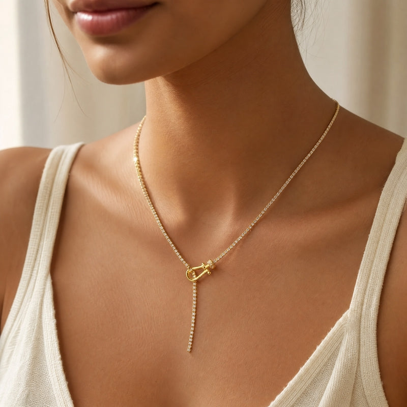 Gold CZ tennis lariat necklace, pavé buckle-hook drop