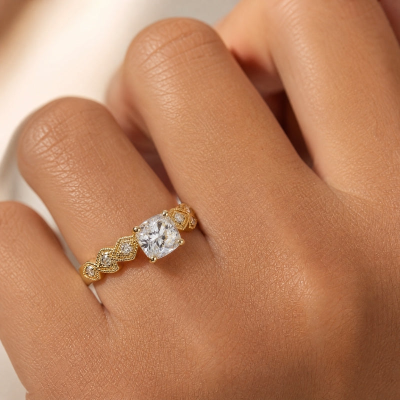 Gold solitaire ring, cushion-cut CZ, pavé zigzag shoulders