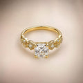 Gold solitaire ring, cushion-cut CZ, pavé zigzag shoulders