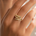 Gold bamboo-style wrap bypass ring, CZ pavé oval tips
