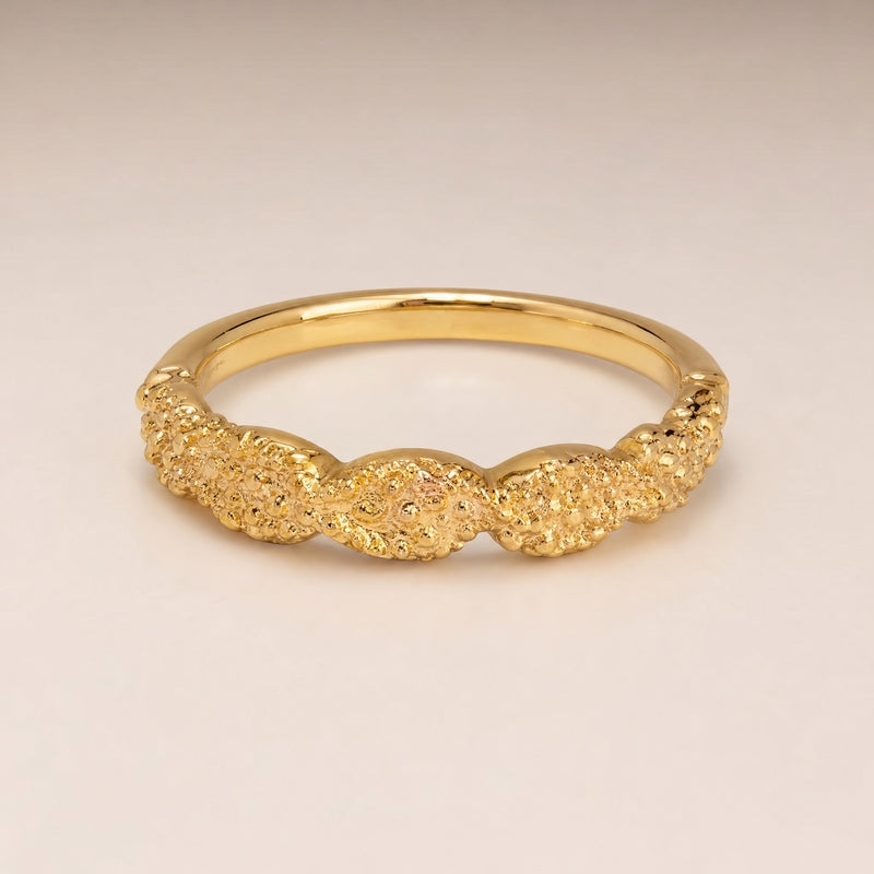 Gold thin-band ring, CZ pavé twisted half-eternity front