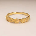 Gold thin-band ring, CZ pavé twisted half-eternity front