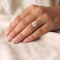 Gold halo ring, oval CZ centre, pavé halo & shoulders