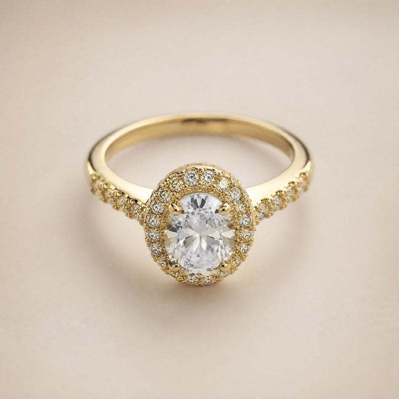 Gold halo ring, oval CZ centre, pavé halo & shoulders