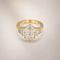 Gold statement ring, large oval CZ, stepped baguette shoulders